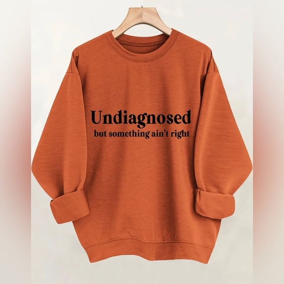 NWT “Undiagnosed but something ain’t right” Funny Orange Graphic Sweatshirt - Picture 1 of 3